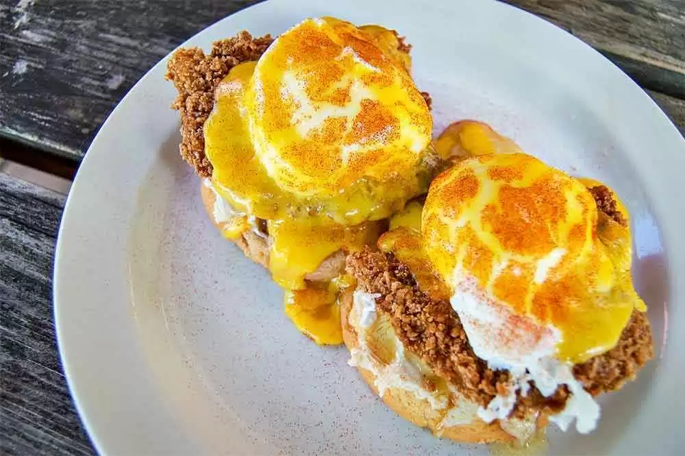 Texas Road Trip: Best Gluten Free Restaurants - Company Cafe’s Bumblebee Scratch: Fried chicken, poached eggs, hollandaise, honey butter, mascarpone, and our gluten-free biscuit.