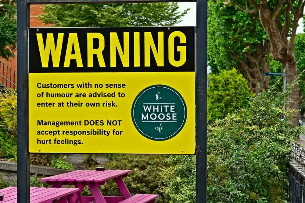 Gluten-Free Diners Need a Sense of Humor at Luxury Dublin Restaurant - Warning sign at Dublin's White Moose Café. Image: Flickr