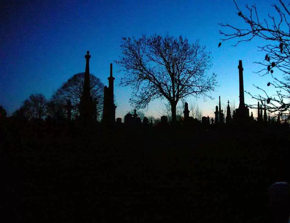 New Study Says that People with Celiac Disease May Die Earlier than Non-Celiacs - Dusk in a cemetery. Image: CC BY-SA 2.0--MGSpiller