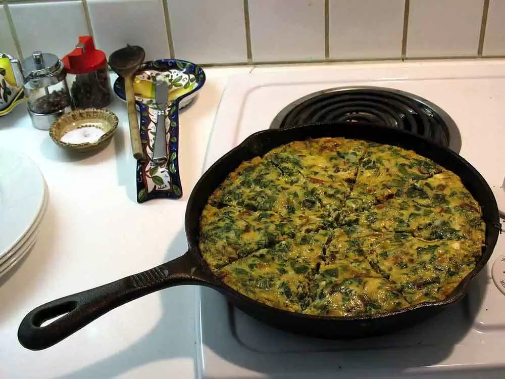 Cheesy Fresh Herb and Asparagus Frittata (Gluten-Free) - Image: CC BY 2.0--milesgehm