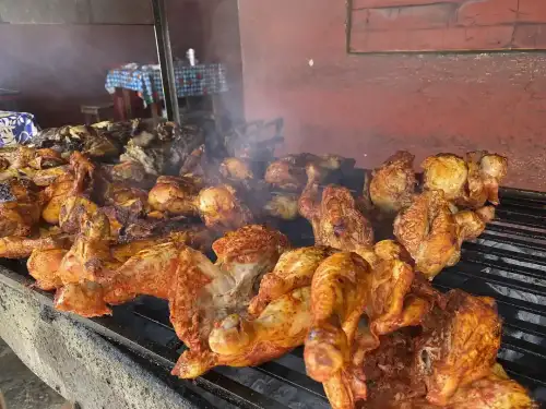 Authentic Mexican Gluten-Free Marinated Grilled Chicken (Pollo Asado) - Pollo asado al carbón, Valladolid Yucatan Marzo 2021 by Sharon Hahn Darlin is licensed under CC BY 2.0.