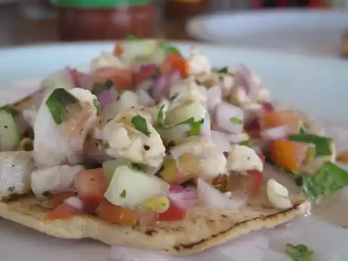 Gluten-Free Peruvian Ceviche Recipe - Tostada de ceviche by Los viajes del Cangrejo is licensed under CC BY 2.0.